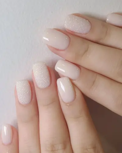 Milky white nails with glitter Milky white nails with glitter
