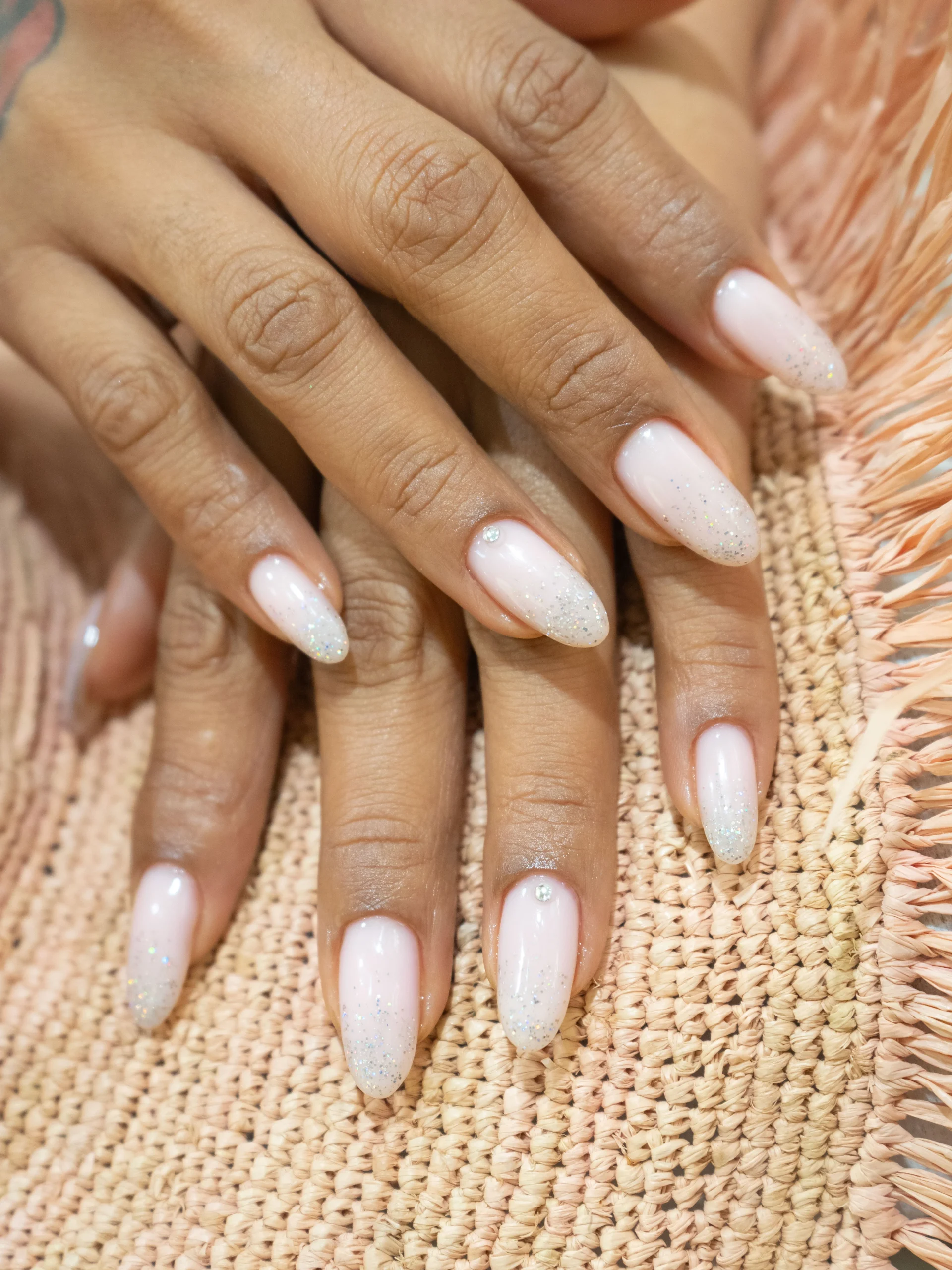 Glitter Ombre Nails in JVC Glitter ombre nails in JVC with milky pink Gelish manicure